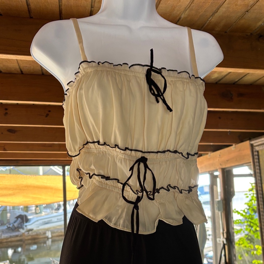 Elegant Cream Camisole with Black Accents